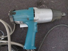 1 x Makita Impact Driver, 1 x Makita Grinder. Condition unknown - 2