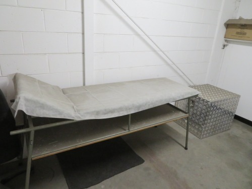 Sick Bay Contents comprising; Sick Bed, Steel Frame, Vinyl Upholstered Top; Table & 2 x Chairs; Bookcase