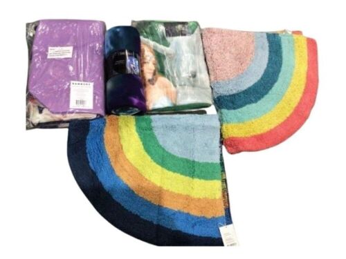 Assorted bath mats blankets and towels