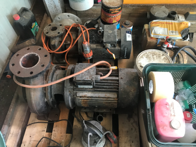 Various spare parts including: 4 x Motorised pumps, assorted induction motors, dosing pumps, small parts bins