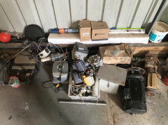Various spare parts including: 4 x Motorised pumps, assorted induction motors, dosing pumps, small parts bins - 4