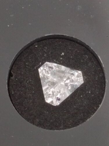 One Loose Diamond (Two chips are present near the top two edges of the girdle) - Insurance Payout $11,000