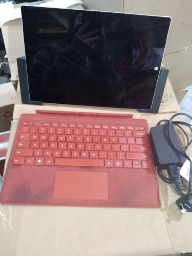 Surface Pro Microsoft w/ Stand & orange keyboard cover (second hand)