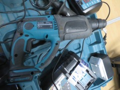 Makita Hammer Drill, 18 Volt, DHR202, No Battery
2 x Chargers, DC18RC, DC18WA
1 x Makita Light, DML805 with Cord - 2