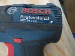 Box containing Bosch Impact Driver, GDX18V-EC, XUI Grinder, 100mm, Ryobi Jigsaw, EJS500LL, Ozito Jigsaw - 7