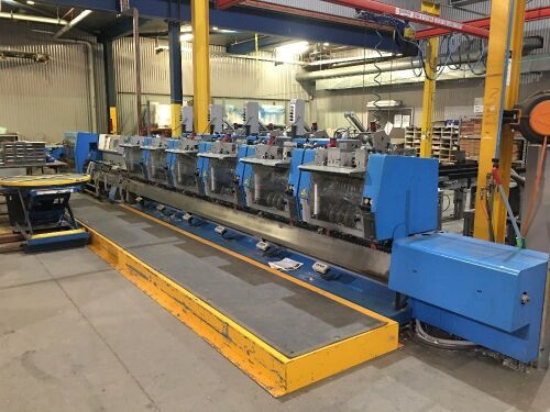 Make an offer - 2007 MULLER MARTINI Prima 6 Station SADDLE STITCHER with stream feeders and Pratico Stacker, blue, no cover feeder. Demag Overhead log crane.