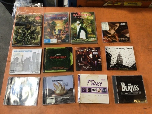Bulk lot of CDs and DVDs
