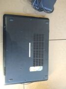 Dell Latitude 5450 [S/N: 2R9MM32] No HardDrive + Charger | 5 of 6 backinf screws are missing also Has minor scratches, suff marks and rubber screen rim has lifted. - 3