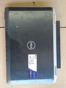 DNL Dell Latitude E6320 | No HardDrive [S/N: has beenremoved ] w/ bottom attachment | no Charger, missing cd eject cover , Minor Damage, rubber screen rim peeling back, scratches and scuff marks. - 2
