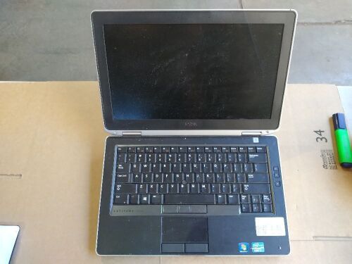 Dell Latitude E6330 | No HardDrive [S/N: 9YV5XY1 ] w/ bottom attachment | no Charger, Damage, scratches and scuff marks.