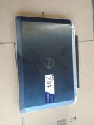 DNL Dell Latitude E6320 | No HardDrive [S/N: HM1QGV1 ] w/ Charger | Minor scratches and scuff marks. - 2