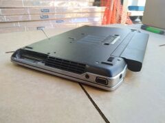 DNL Dell Latitude E6320 | No HardDrive [S/N: HM1QGV1 ] w/ Charger | Minor scratches and scuff marks. - 5