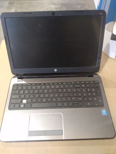DNL Hp 250 G3 | No HardDrive | SN: CND0106TB | +Charger | Minor scratches and scuff marks, missing all backing screws, missing CD drive, the 'Z' key is missing and right side hinge missing bottom plastic cover.