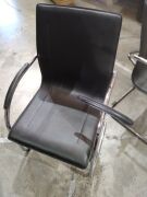 DNL Black pleather S Office Chairs | 5 Chairs | 4 are missing The right arm rest, 1 has a broken left arm rest(isn't attached) - 4
