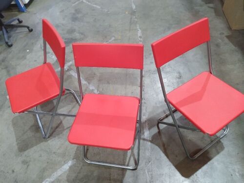 Red folding chairs x4 | Minor scratches and scuff marks