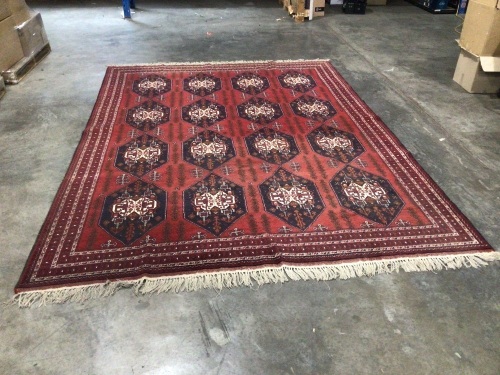 Hand stitched Persian style rug, 3.4m x 2.5m, red base with blue and white geometric pattern