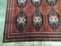 Hand stitched Persian style rug, 3.4m x 2.5m, red base with blue and white geometric pattern - 3