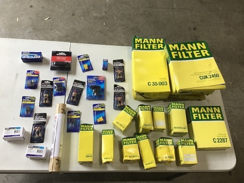 Box of various automobile accessories from Man Filter, Narva and Projecta. Please refer to images of items