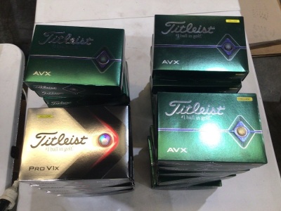 Box of 14 x 12 pack Titleist AVX yellow golf balls, 7 x 12 pack Titleist AVX white golf balls, 7 x 12 pack Titleist Pro V1X yellow golf balls 