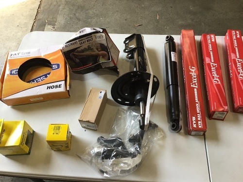 Box of shock absorbers, oil filter chaos, seat belt, hose and more. Please refer to images of items.