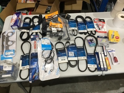 Box of various sizes poly v belts, radiator hoses, spark plugs etc. Please refer to images of items.