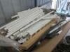 Group lot of contents to table top comprising; PVC plumbing fittings & Rinnai Gas Heater (Contents only)