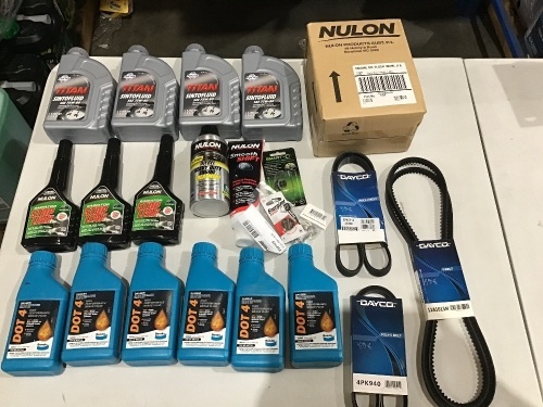 Box of Titan Sintofluid, Dayco v belts, Dot 4 radiator stop leak, etc. Please refer to images of items.
