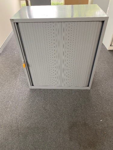 Sliding door storage cabinet with lock