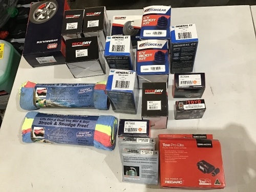 Box of spark plugs, wheel bearing kits, brake pads, cv boot kits etc. Please refer to images of items.