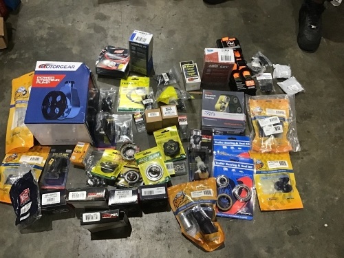 Box of power steering pump, rear wheel cylinders, radiator caps, thermostats, trailer wheel bearing sets, light restoration kit, brake pads etc. Please refer to images of items.