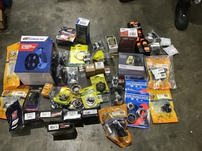 Box of power steering pump, rear wheel cylinders, radiator caps, thermostats, trailer wheel bearing sets, light restoration kit, brake pads etc. Please refer to images of items.