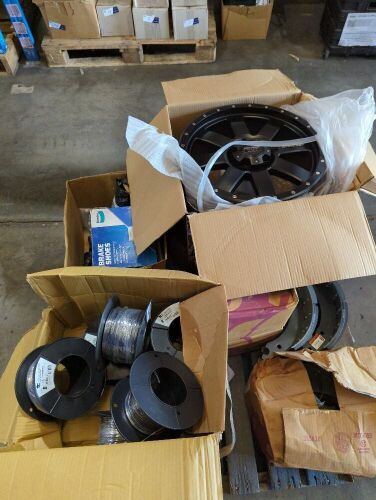 Bulk pallet of Pro Comp wheel, drum brake pads, various lengths of electrical cables, brake drum, nuts, shock absorbers.  Please refer to images of items.