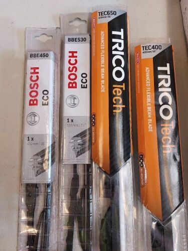 Box of assorted wiper blades, brands including Bosch and Trico, refer to photos for model numbers. Please refer to images of items.
