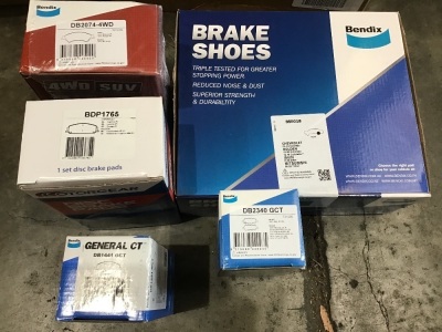 Box of brake shoes and brake disc. Please refer to images of items.