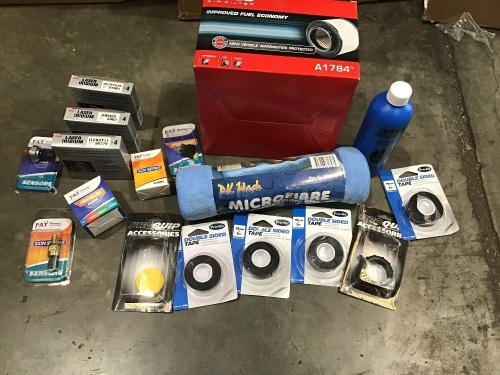 Box of Ryco air filter and various spark plugs, double sided tape, microfibres cloths etc. Please refer to images of items.