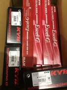 Box of strut mount kits, and KYB gas shock absorbers. Please refer to images of items.  - 2