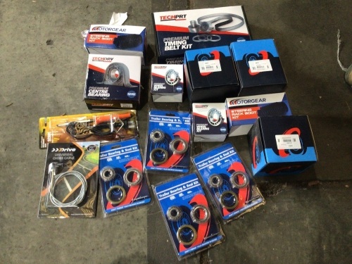 Box of timing belt kits, wheel bearing kit, and more. Please refer to images of items.