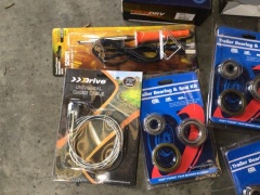 Box of timing belt kits, wheel bearing kit, and more. Please refer to images of items. - 2