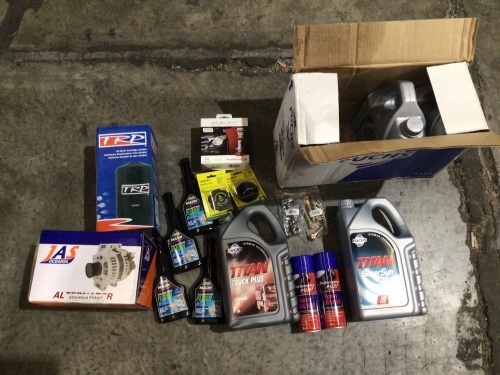 Box of engine oil, grease, alternator, air dryer cartridge, radiator flush clean, fuel caps & More. Please refer to images of items.