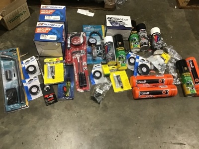 Box of wheel brace, sealed beam lights, trim and clip, whammy, paint, silicone spray, tyre inflator etc. Please refer to images of items.