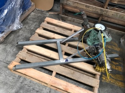 Metering valve and fittings on steel frame