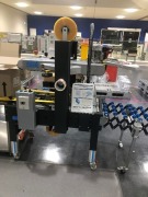 Packing Line 5 comprising; SNAP (Sterile Non-Aligned Packing) Unloading Cell, Manufacturer: A&RT (Robot is SOLD ); Klockner TEVO-300BM/RT-48 Flow Wrapper; Klockner TEVO P-700; Anritsu KW6338Check Weigher; Siat SMP1-P Case Sealer - 8