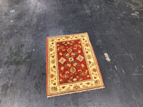 Hand woven rug - 0.88m x 0.61m