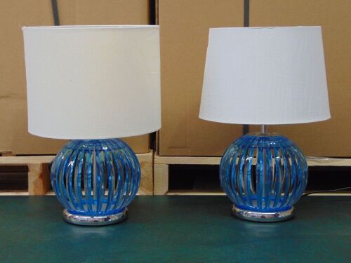 Pair of Matching bedside lamps. Blue Plastic Base with Beige/White Shades. Both Shades are different styles, bases are the same