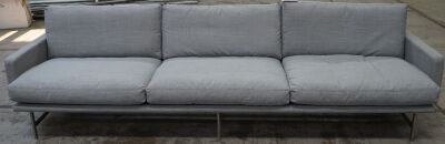 Lissoni 3 seater sofa with armrests, two blemishes on rear of lounge.