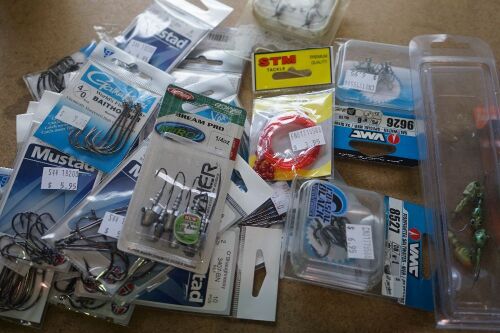Box of assorted fishing tackle.