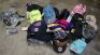 box of assorted kids sunvisors, caps and sunglasses