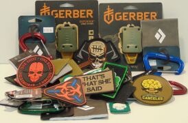Carton of assorted carabiners and velcro patches.