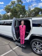 Hot Pink Suit Worn by 12-year-old Nicholas, donated in support of the McGrath Foundation - 2
