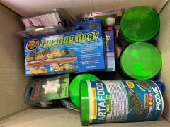 DNL box of assorted turtle enclosure accessories and turtle feeding pellets. - 2